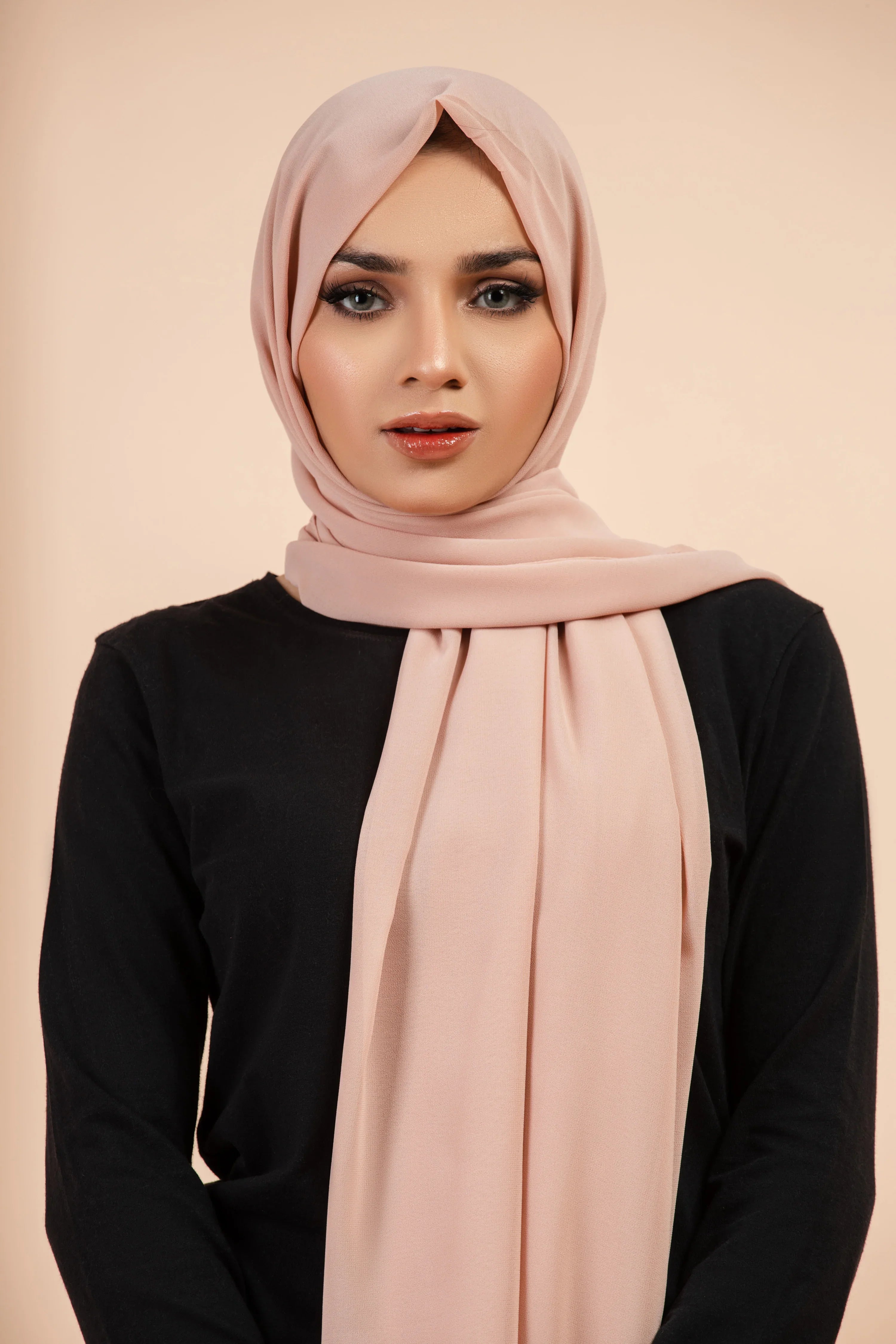 Premium Georgette - Smoked Salmon Georgette Hijab worn by model, lightweight and flowy drape.