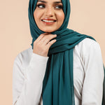 Premium Georgette - Teal Georgette Hijab worn by model, lightweight and flowy drape.