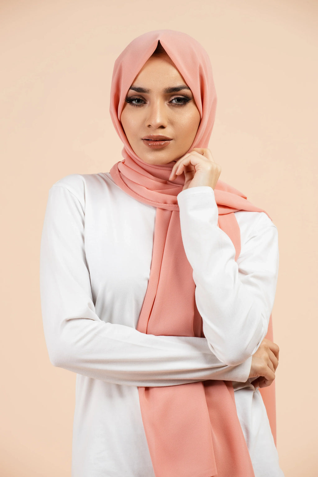 Premium Georgette - Warm Peach Georgette Hijab worn by model, lightweight and flowy drape.