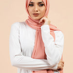 Premium Georgette - Warm Peach Georgette Hijab worn by model, lightweight and flowy drape.