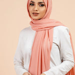 Premium Georgette - Warm Peach Georgette Hijab close-up of smooth georgette fabric texture.